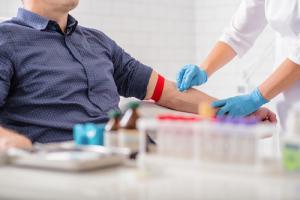 Doctor drawing blood from a patient for a blood donation