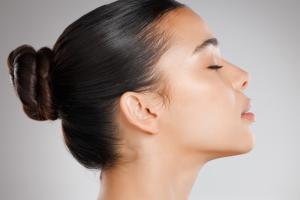 Side face profile woman with smooth skin